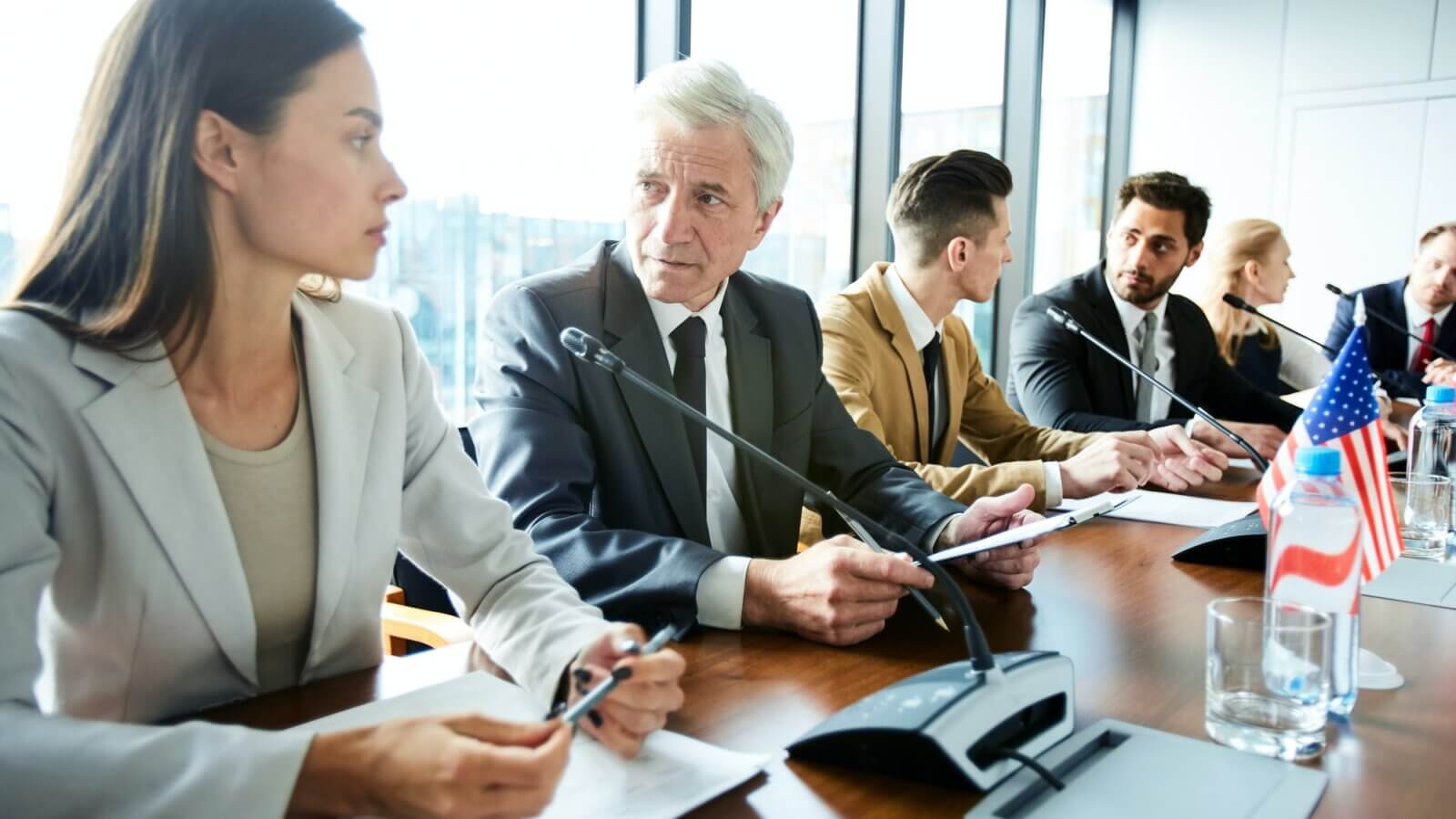 Pensive representative of governments advising each others