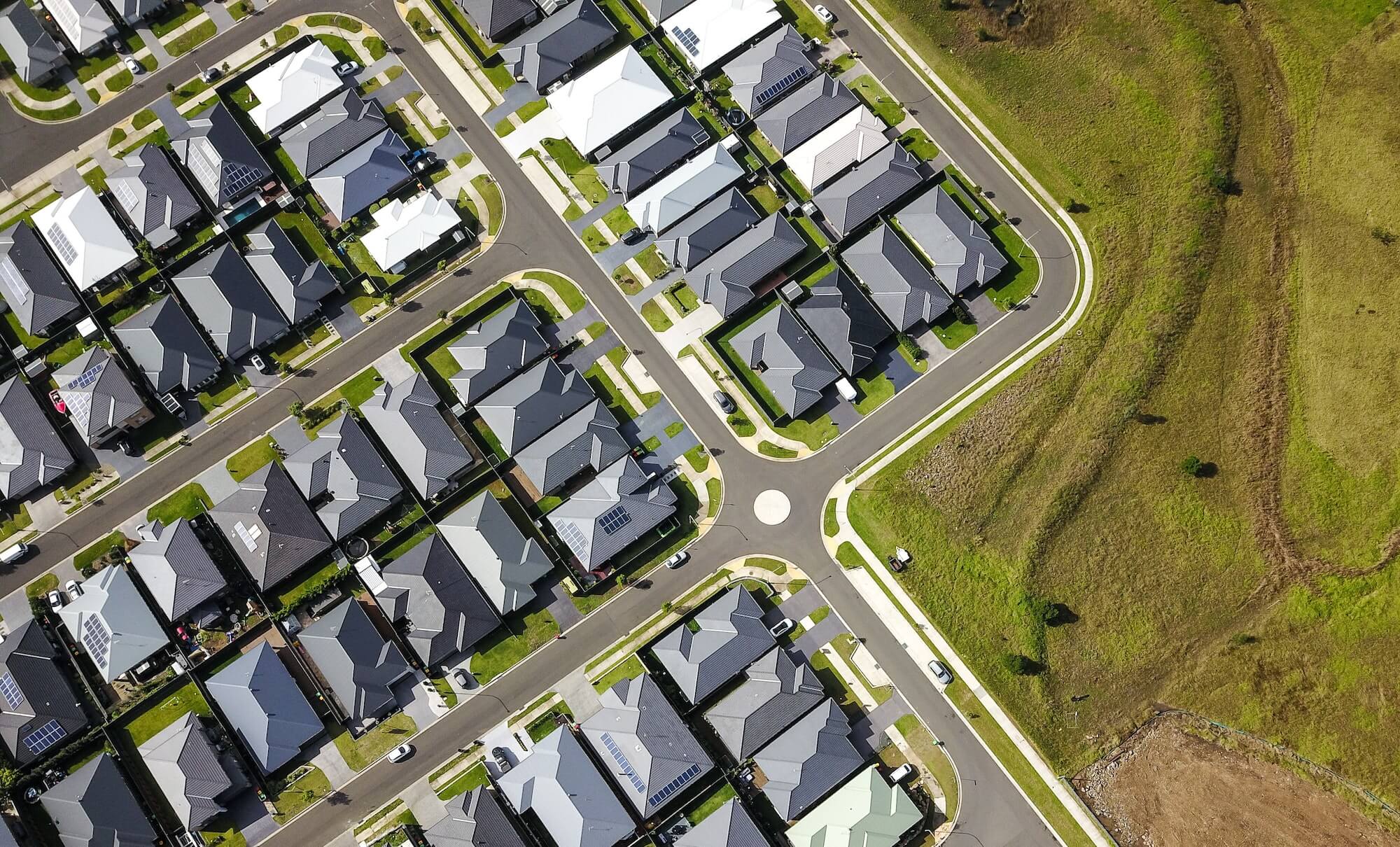 An aerial view of a new housing estate in the suburbs. Urban sprawl