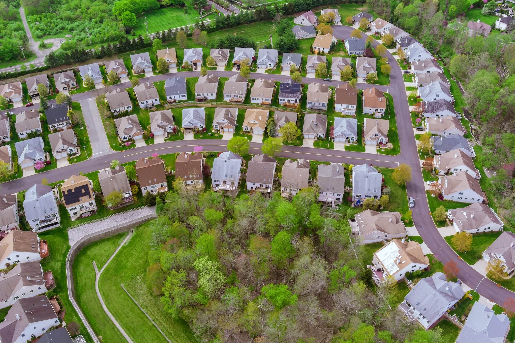 Aerial view of roof houses in America small town in the countryside top view above houses in NJ USA